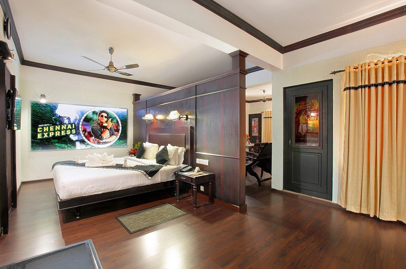 Scenic Deluxe Bedroom at The Sivertips Hotels in Munnar Overlooking Green Hills