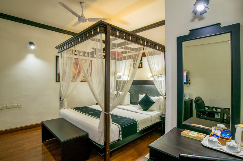 Luxury Mountain View Bedroom at The Sivertips Hotels in Munnar With Warm Lighting