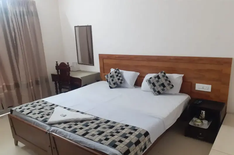 Elegant bedroom with a calming ambiance at Mushroom Valley Cottage