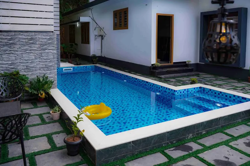Swimming pool under open sky at Kalt Munnar Homestay at Kalt Munnar Homestay