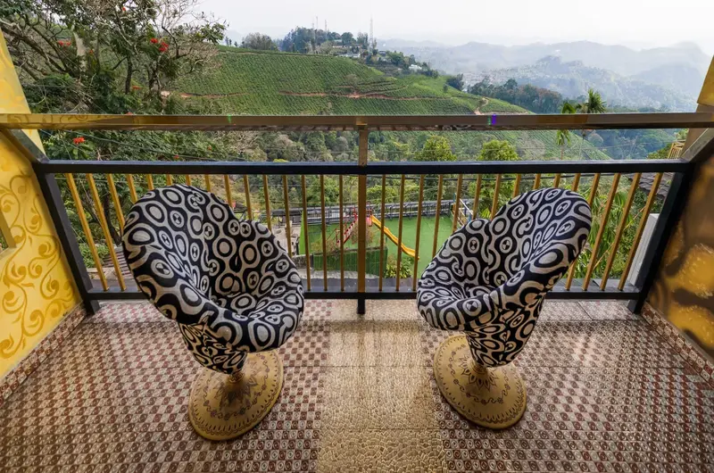 Balcony resting area at Pool Villas By Parakkat Nature Hotel And Resorts