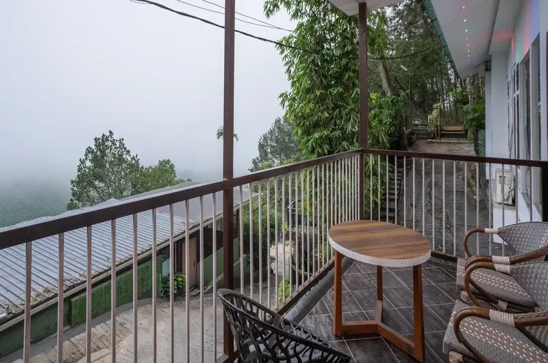 Misty resort balcony view at Pool Villas By Parakkat Nature Hotel And Resorts