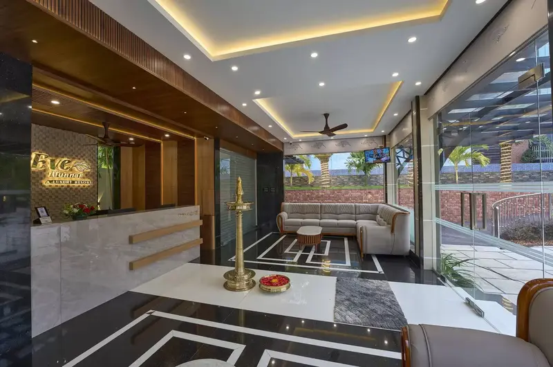 Modern luxury lobby interior with elegant lighting and stylish seating at Eve Munnar Luxury Resort