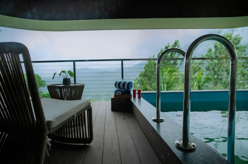 Luxury suite balcony with private plunge pool at Mountree Munnar