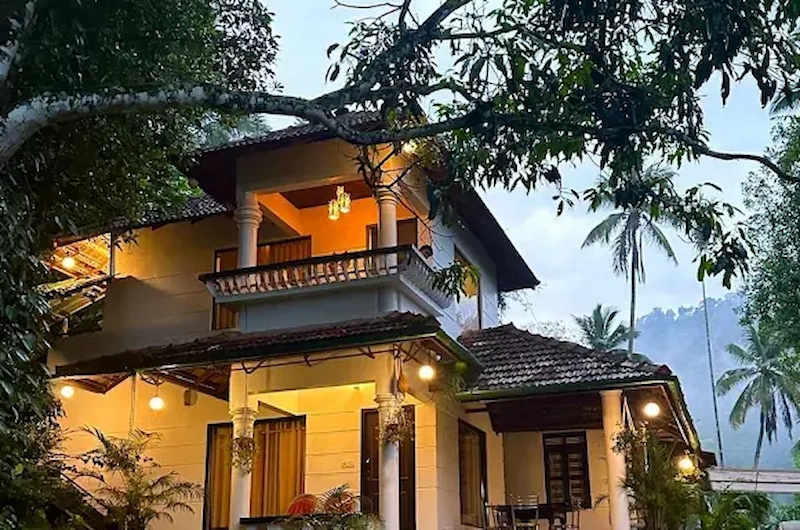 Night illumination view of Thoppil Homestay building in Munnar